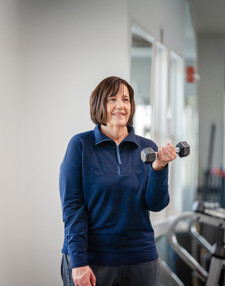Woman with a dumbell