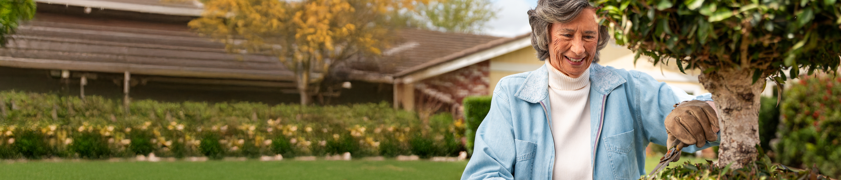 Woman cutting plants
